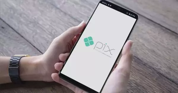Ilustração de uma transação financeira com Pix e cartão de crédito.